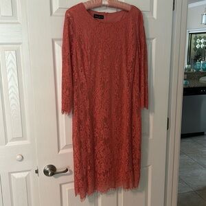 Size 8 coral colored lace dress w/ 3/4 sheer lace sleeves. Great shape